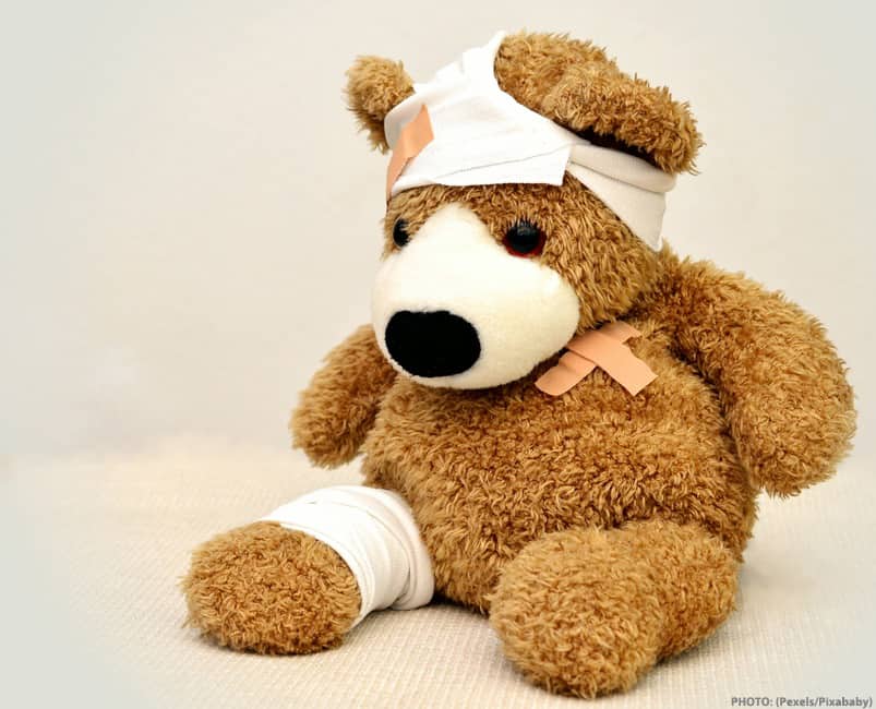 injured and bandaged teddy bear