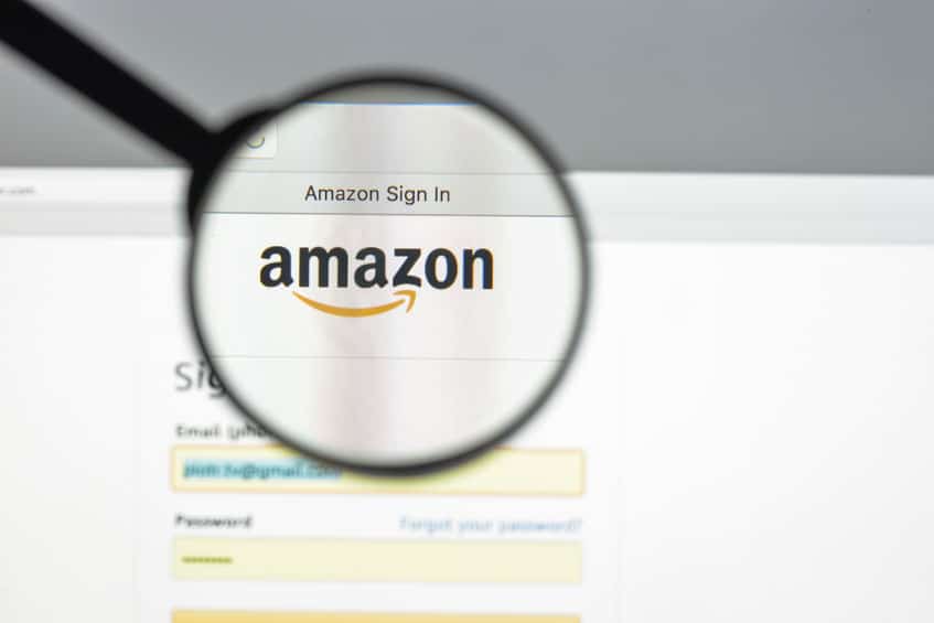 a magnifying glass over the amazon.com sign in page, magnifying the amazon logo