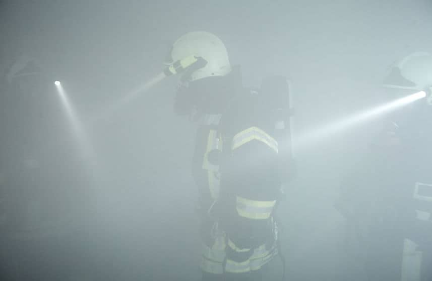 search rescue fire explosion, view of fire safety person in smoke