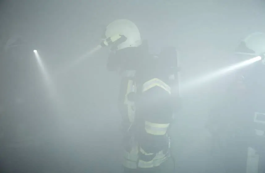 search rescue fire explosion, view of fire safety person in smoke