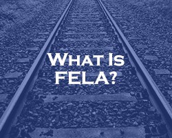 What Is FELA? - blue overlay on railroad tracks