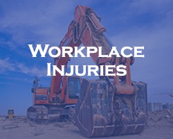 Workplace Injuries - blue overlay on construction equipment