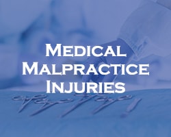 medical malpractice injuries - blue overlay on a close up of surgical tools during a surgery